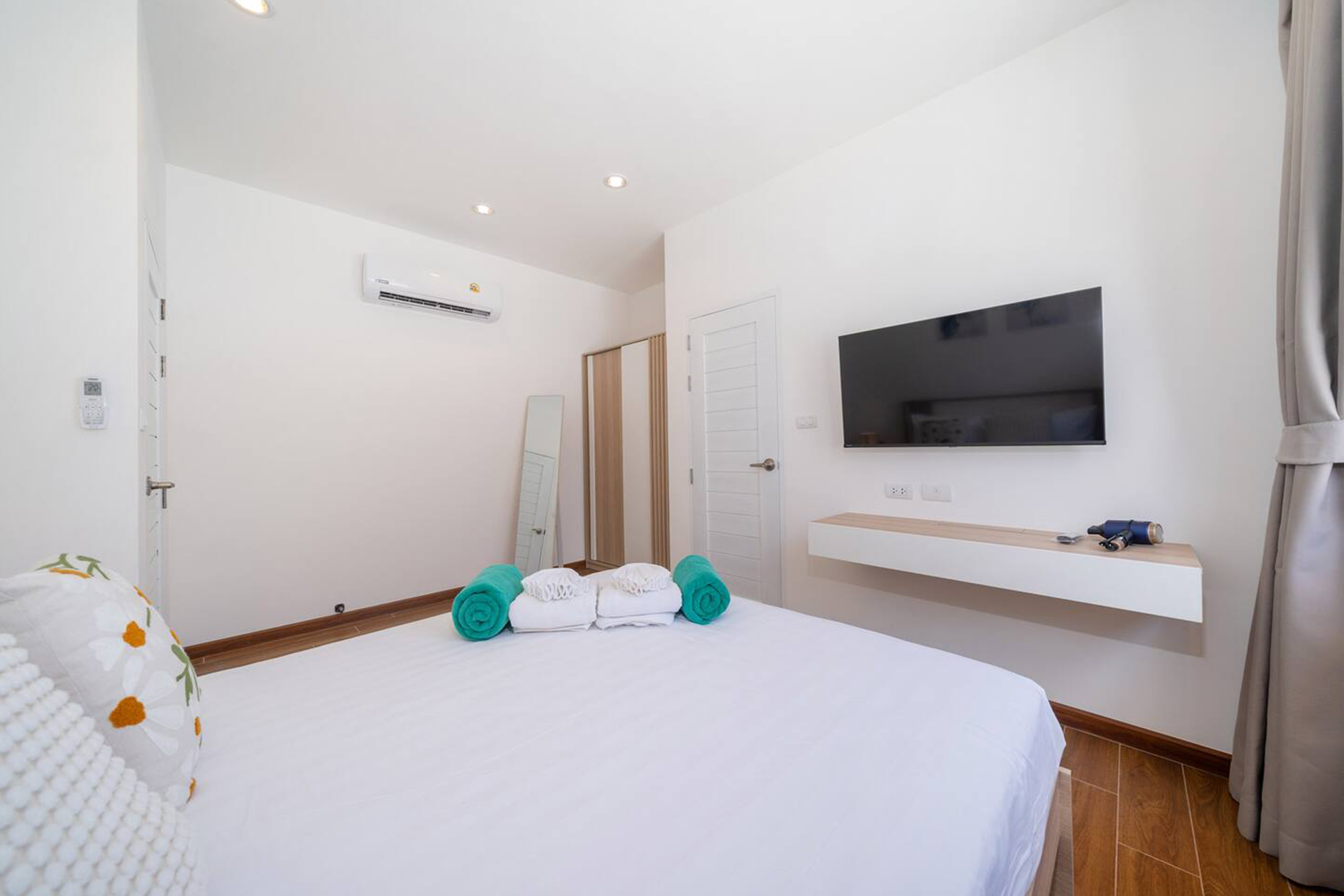 Goldena Twin Kamala bedroom with TV console and minimalist design