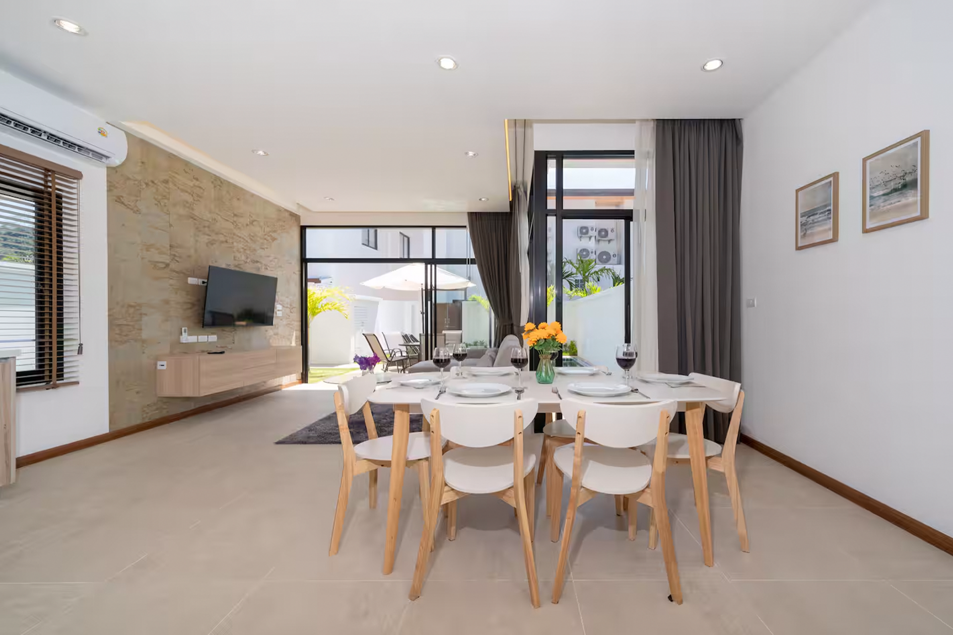 Goldena Twin Kamala dining area with views toward pool terrace