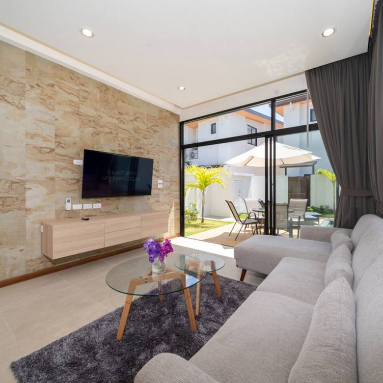 Goldena Twin Kamala modern lounge with large sliding glass doors