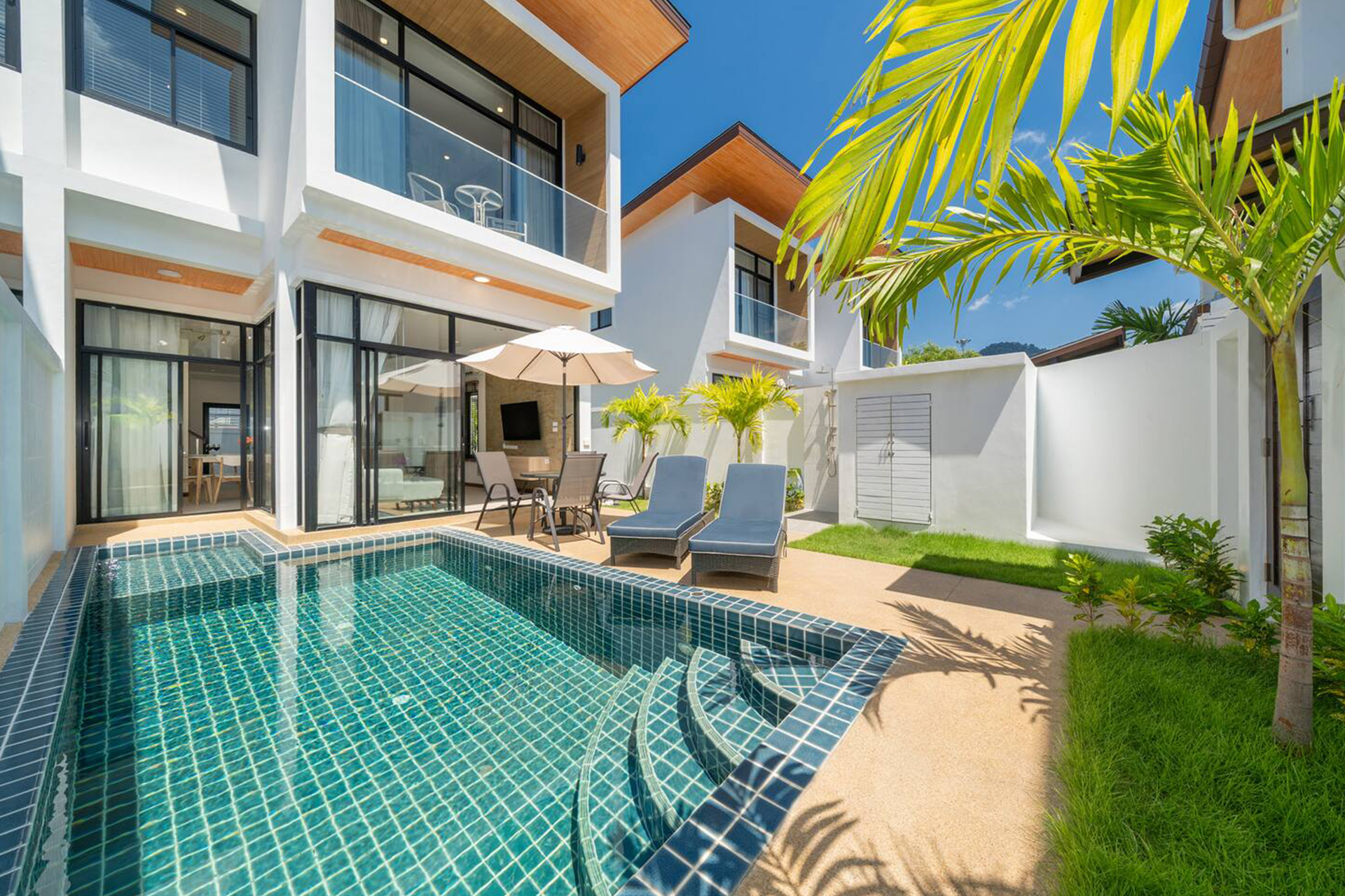 Goldena Twin Kamala pool view showcasing modern villa façade