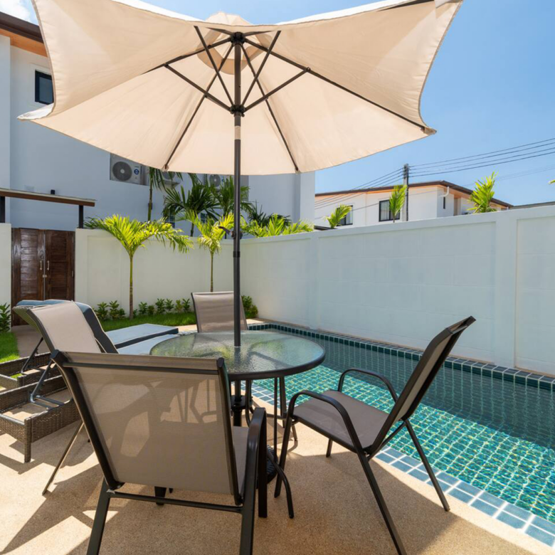 Goldena Twin Kamala poolside patio dining beside private swimming pool