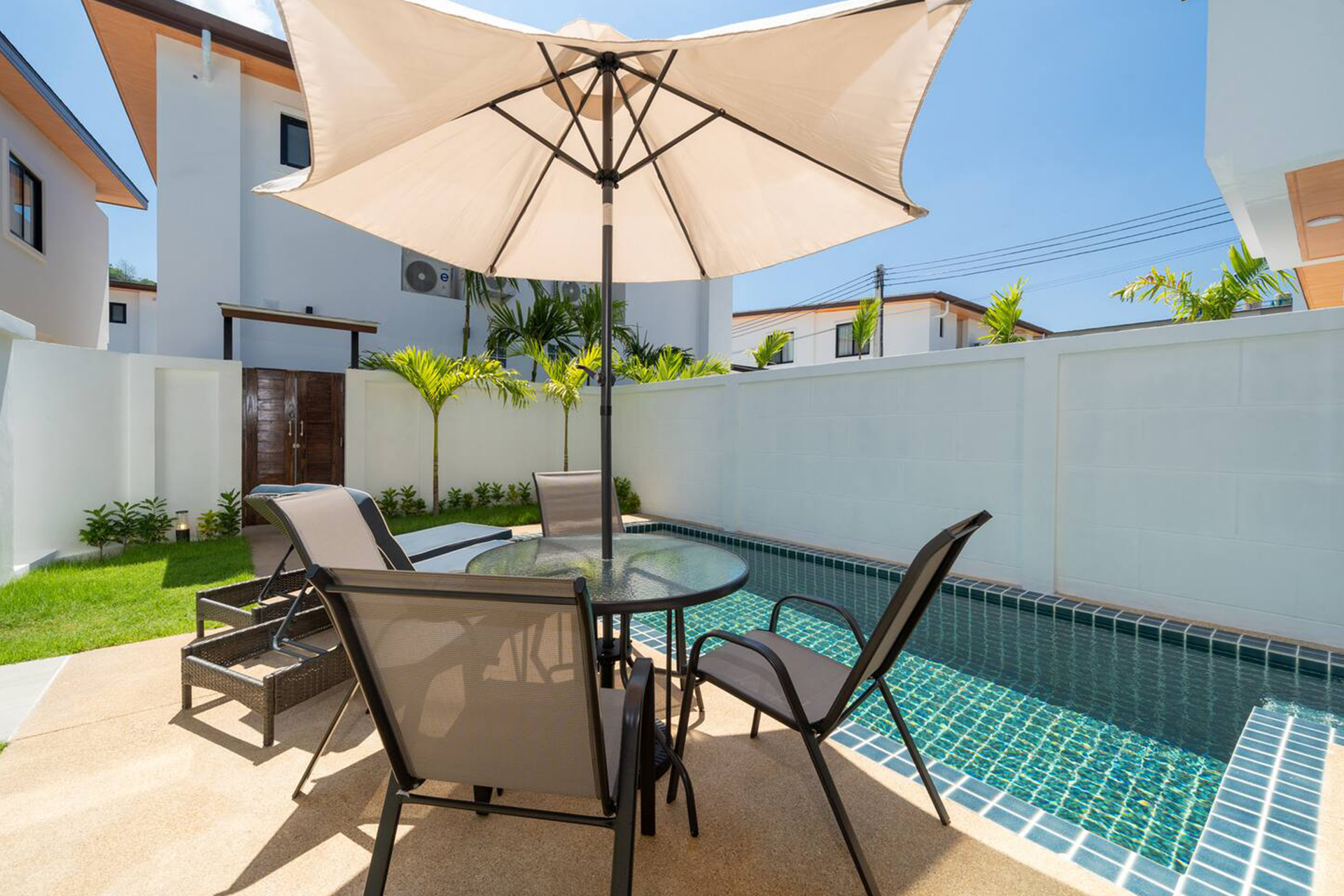 Goldena Twin Kamala poolside patio dining beside private swimming pool