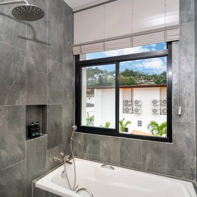 Goldena City Gems Kamala bathtub with window and natural light