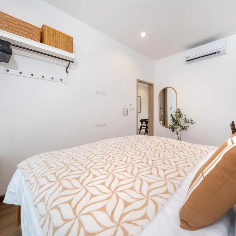 Goldena City Gems Kamala bedroom view with mirror and doorway