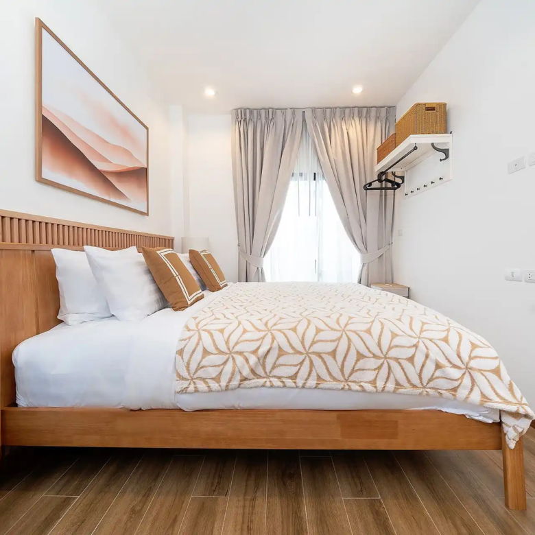 Goldena City Gems Kamala wide bedroom shot in natural tones