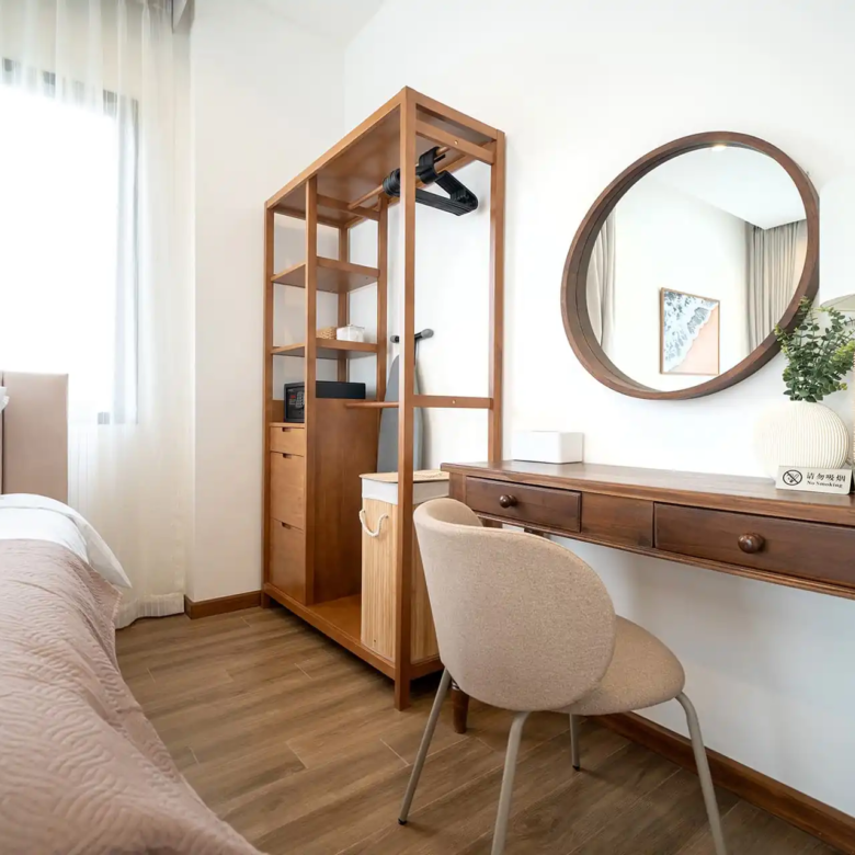 Goldena City Gems Kamala bedroom workspace desk and warm wood tones