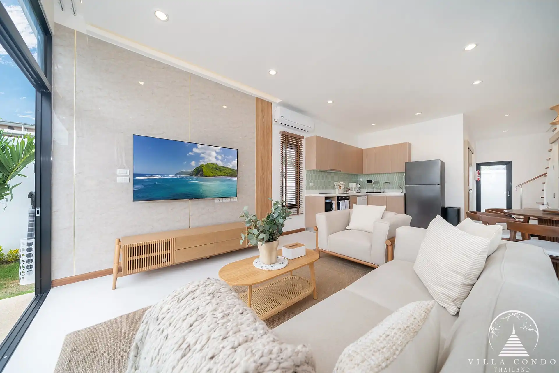 Goldena City Gems Kamala living room with TV and sofa