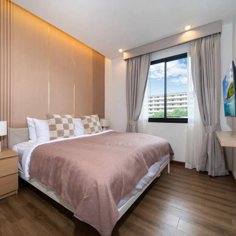 Goldena City Gems Kamala master bedroom with accent wall lighting